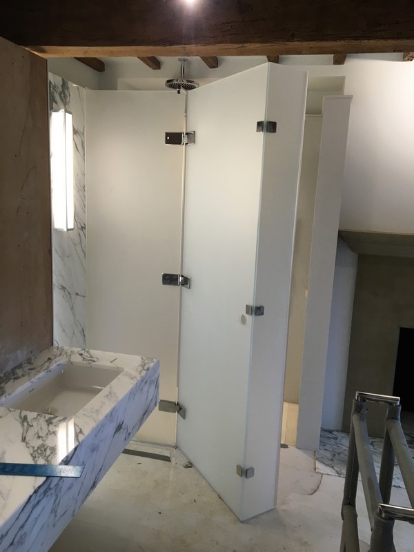 Bespoke frosted glass shower enclosure in Tooting luxury bathroom